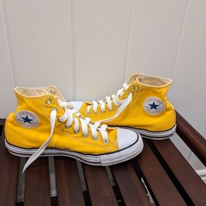 Beautiful yellow Converse high top running shoes